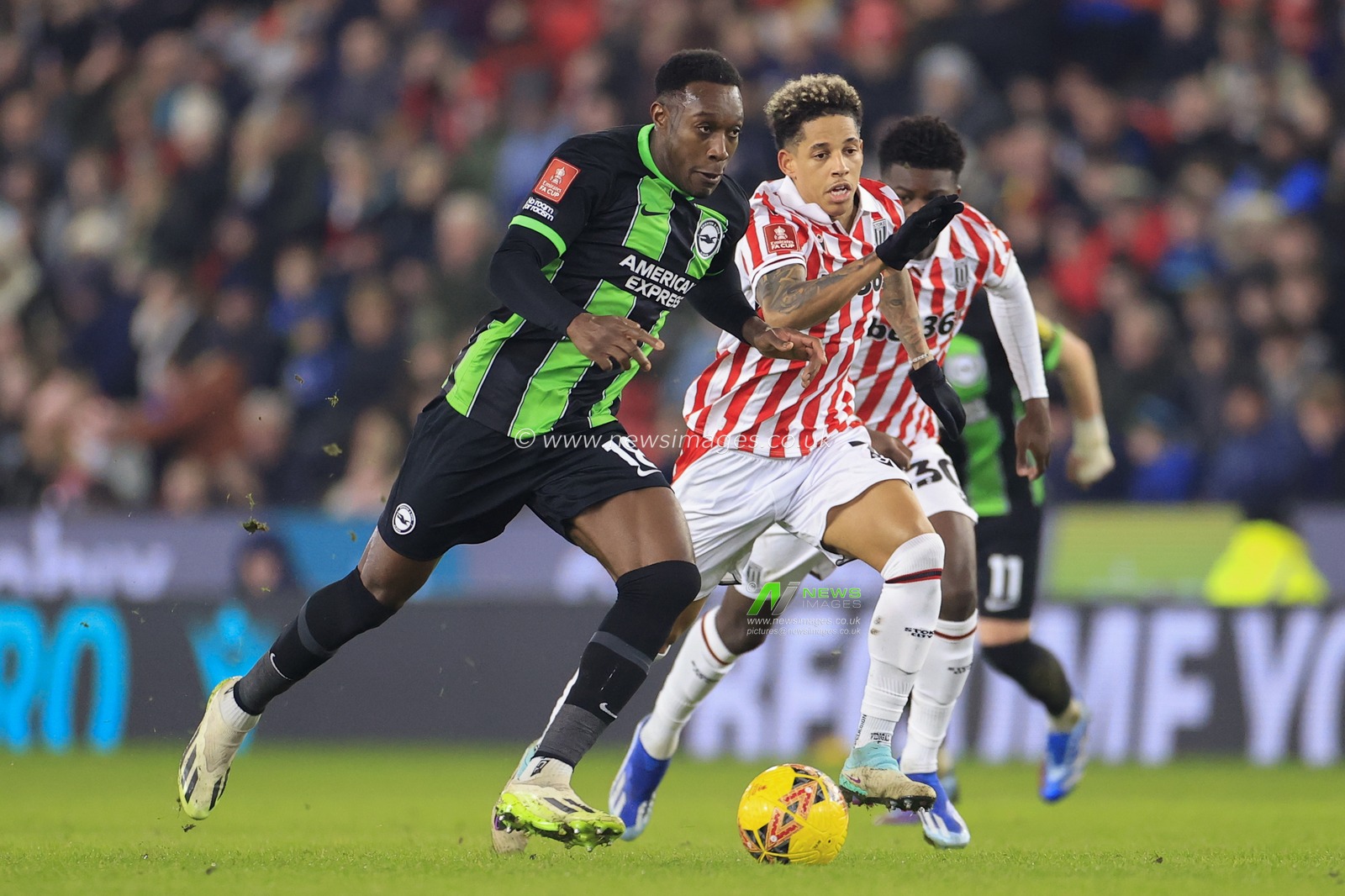 Danny Welbeck of Brighton & Hove Albion runs past Andre Vidigal of Stoke City during the Emirates FA Cup Third Round match Stoke City vs Brighton and Hove Albion at Bet365 Stadium, Stoke-on-Trent, United Kingdom, 6th January 2024

(Photo by Conor Molloy/News Images)