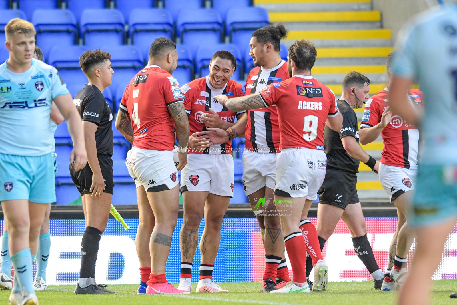 Krisnan Inu (4) of Salford Red Devils celebrates scoring a try with Ken Sio (2) of Salford Red Devils to make it 16-14