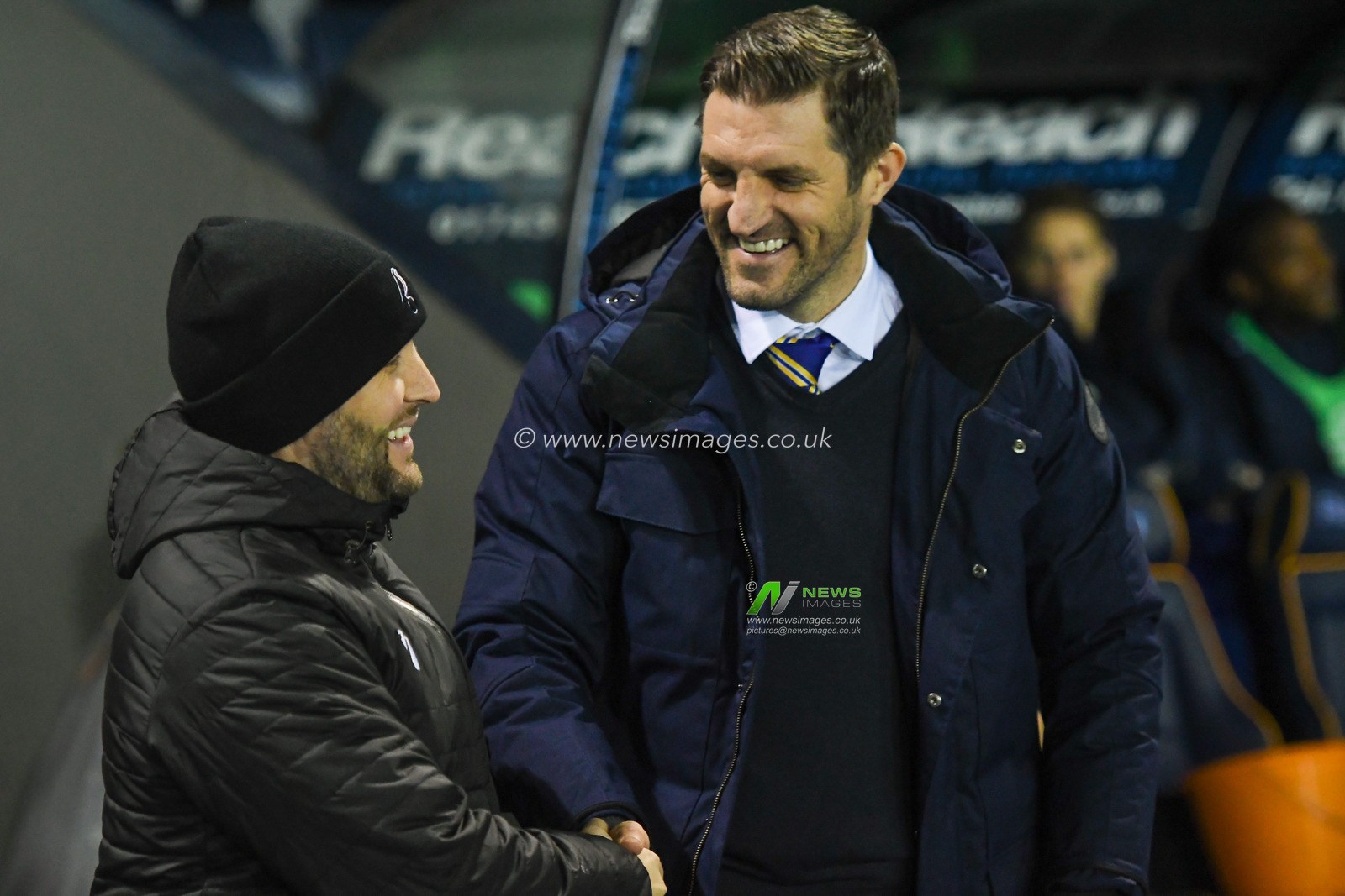 14th January 2020, Greenhous Meadow, Shrewsbury, England; Emirates FA Cup, Shrewsbury Town v Bristol City :
Both Lee Johnson manager of Bristol City and Sam Ricketts Manager of Shrewsbury Town shake hands and crack a joke before kick off
Credit: Gareth Dalley/News Images