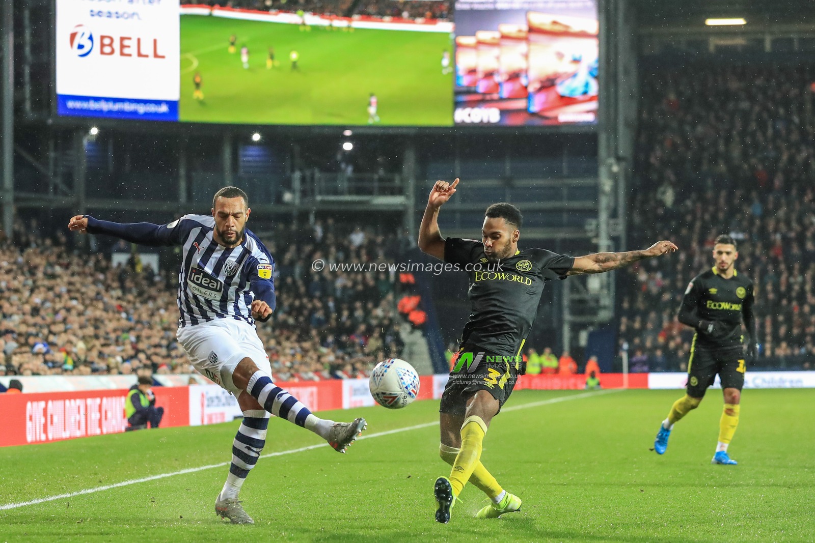 21st December 2019, The Hawthorns, West Bromwich, England; Sky Bet Championship, West Bromwich Albion v Brentford : Matt Phillips (10) of West Bromwich Albion  and Rico Henry (3) of Brentford dual for the ball 

Credit: Mark Cosgrove/News Images