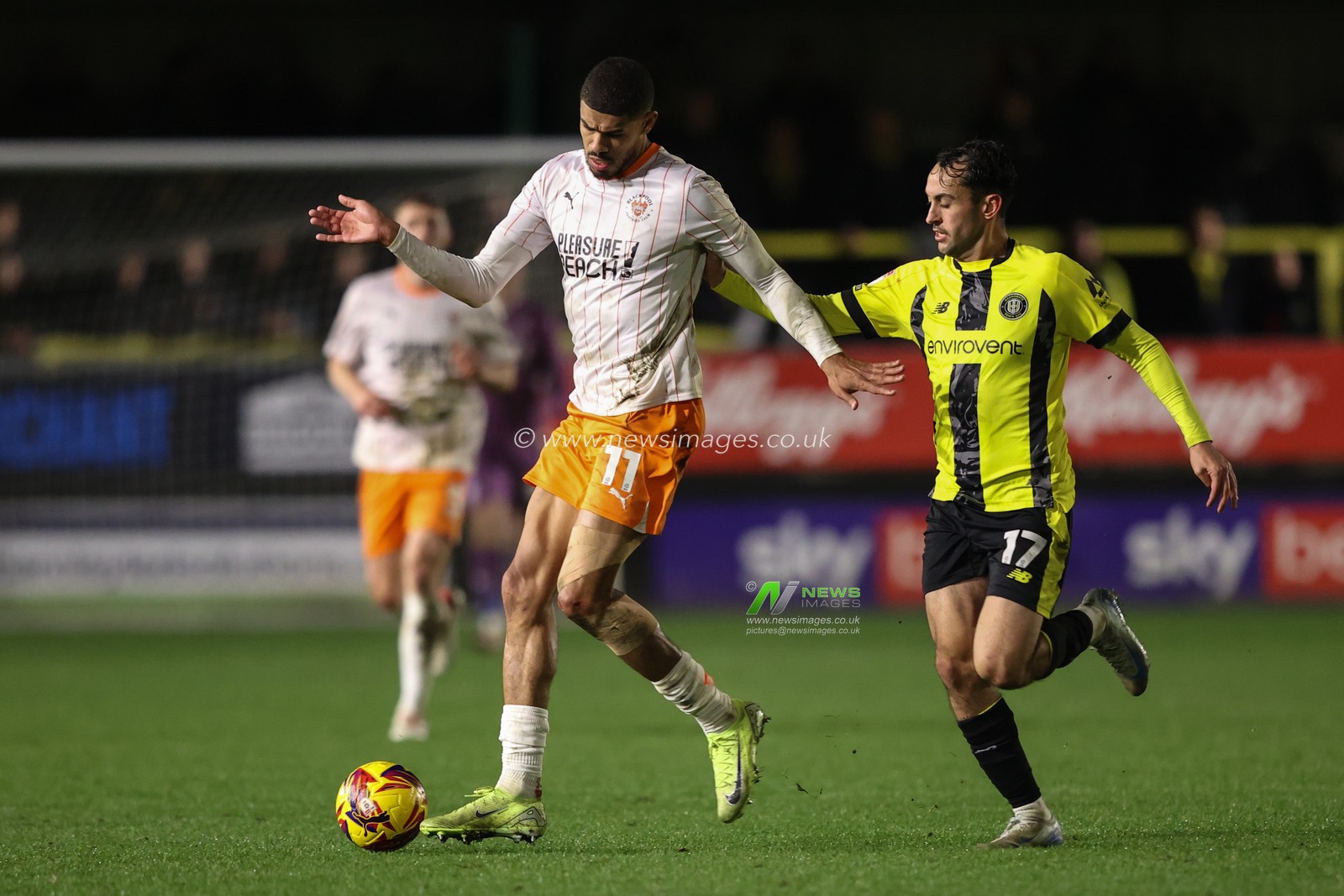Ashley Fletcher of Blackpool and Levi Sutton of Harrogate Town battle for the ball during the Bristol Street Motors Trophy match Harrogate Town vs Blackpool at Wetherby Road, Harrogate, United Kingdom, 12th November 2024

(Photo by Alfie Cosgrove/News Images)