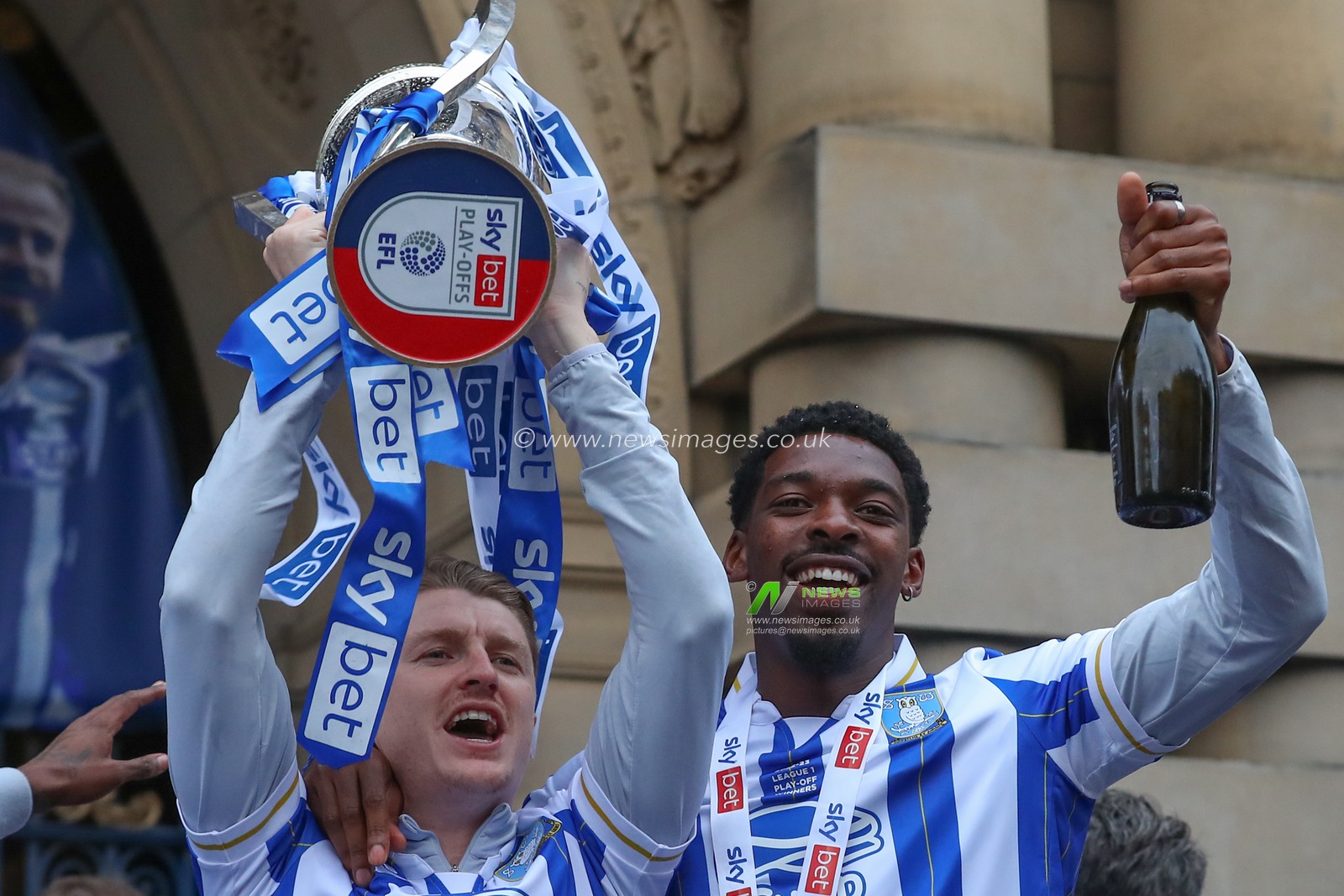 George Byers #14 of Sheffield Wednesday and Tyreeq Bakinson #19 of Sheffield Wednesday celebrate as Sheffield Wednesday celebrate promotion in the City at Sheffield City Centre, Sheffield, United Kingdom, 31st May 2023

(Photo by Gareth Evans/News Images)