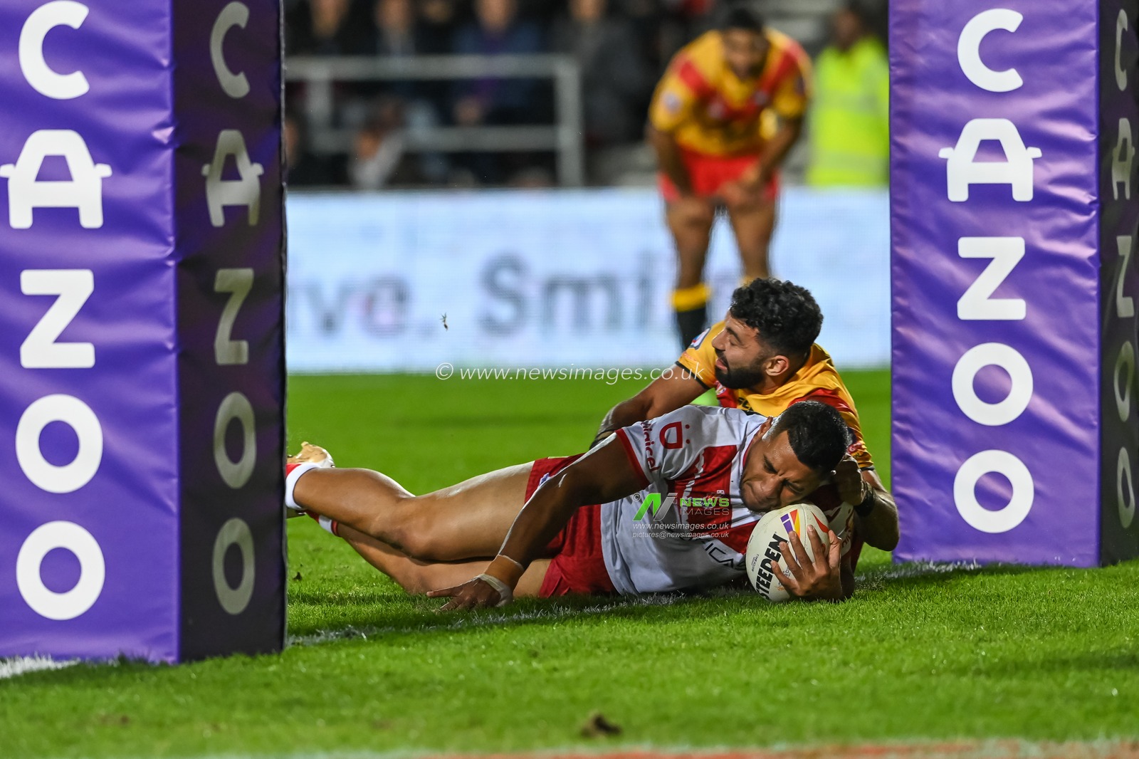 Moeaki Fotuaika of Tonga scores a try during the Rugby League World Cup 2021 match Tonga vs Papua New Guinea at Totally Wicked Stadium, St Helens, United Kingdom, 18th October 2022

(Photo by Craig Thomas/News Images)