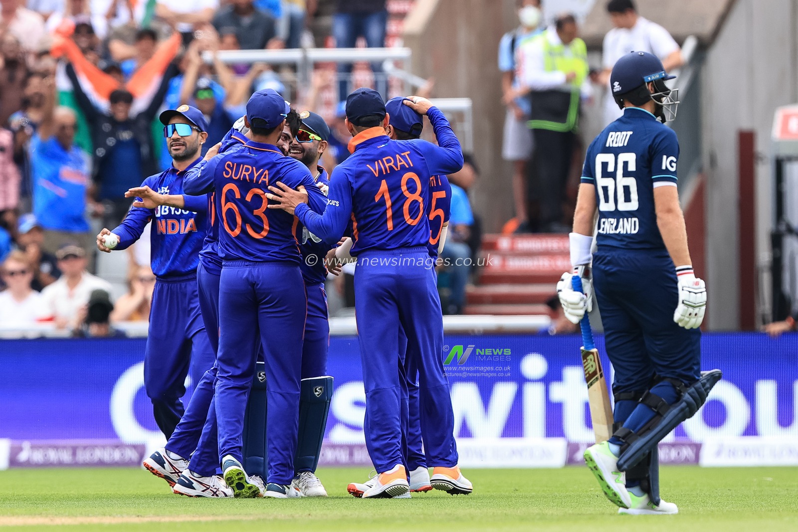 India team celebrate the wicket of Joe Root of England