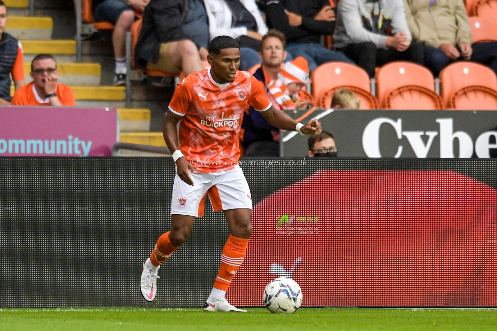 Demetri Mitchell of Blackpool with the ball