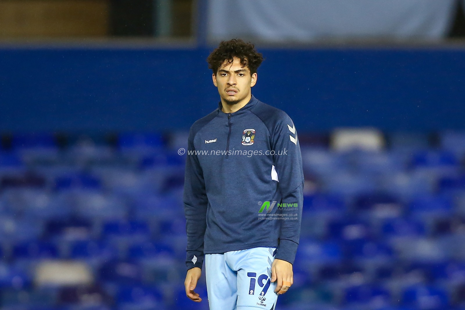 Tyler Walker #19 of Coventry City warming up ahead of the game against Norwich City