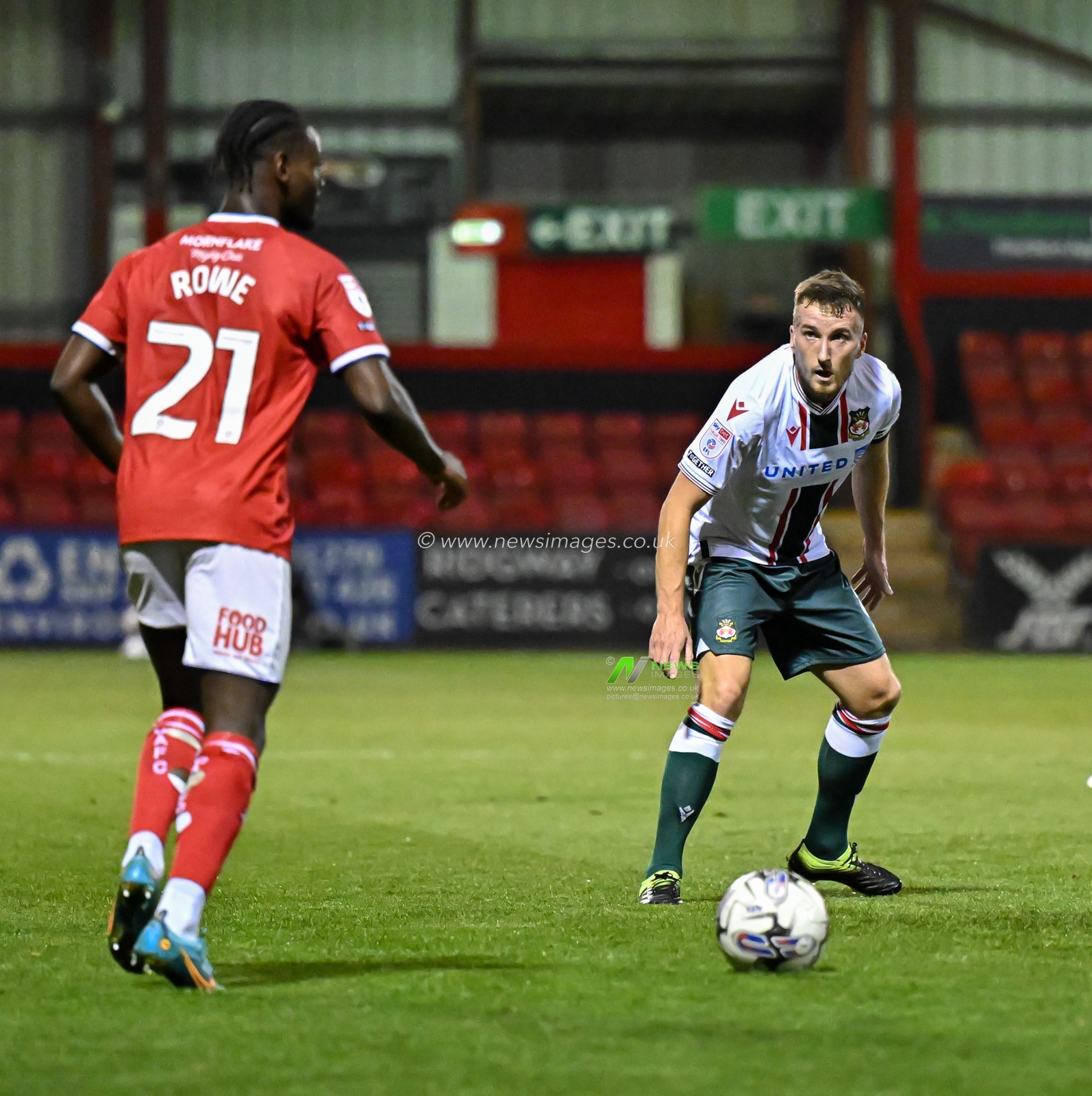 Luke Young 8# of Wrexham Association Football Club looks to close down Aaron Rowe 21# of Crewe Alexandra, during the EFL Trophy match Crewe Alexandra vs Wrexham at Alexandra Stadium, Crewe, United Kingdom, 10th October 2023

(Photo by Cody Froggatt/News Images)