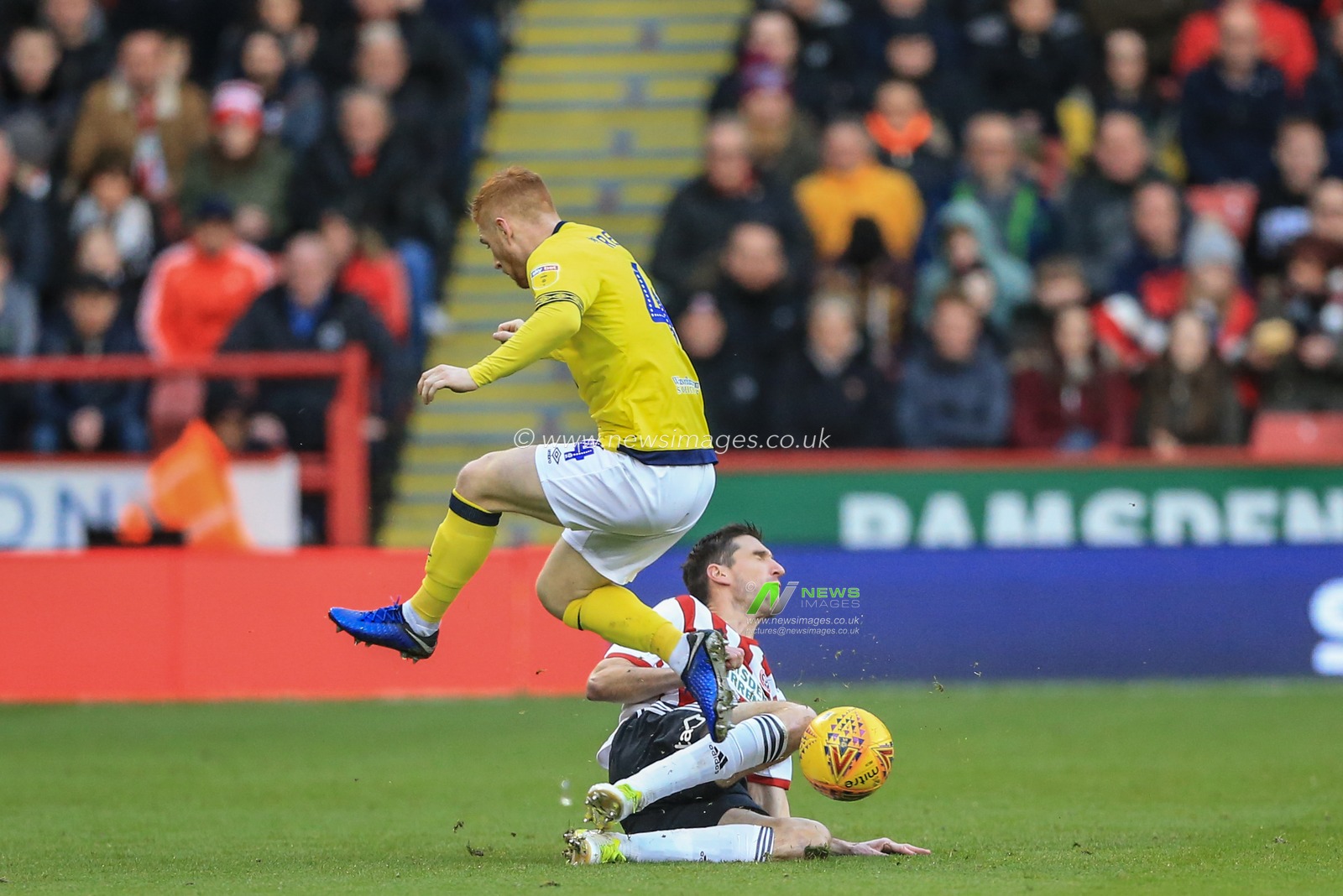 29th December 2018, Bramall Lane, Sheffield, England; Sky Bet Championship, Sheffield United vs Blackburn ; Chris Basham (06) of Sheffield United slides in and fouls Harrison Reed (04) of Blackburn and receives a yellow card 


Credit: Mark Cosgrove/News Images

English Football League images are subject to DataCo Licence