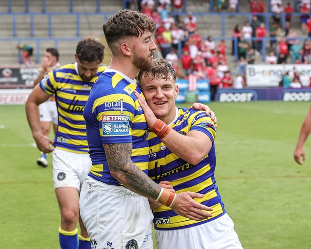 Matty Ashton of Warrington Wolves celebrates the win with Leon Hayes of Warrington Wolves during the Betfred Super League round 19 match Warrington Wolves vs Hull KR at The Halliwell Jones Stadium, Warrington, United Kingdom on 18 July 2026

(Photo by Mark Cosgrove/News Images)