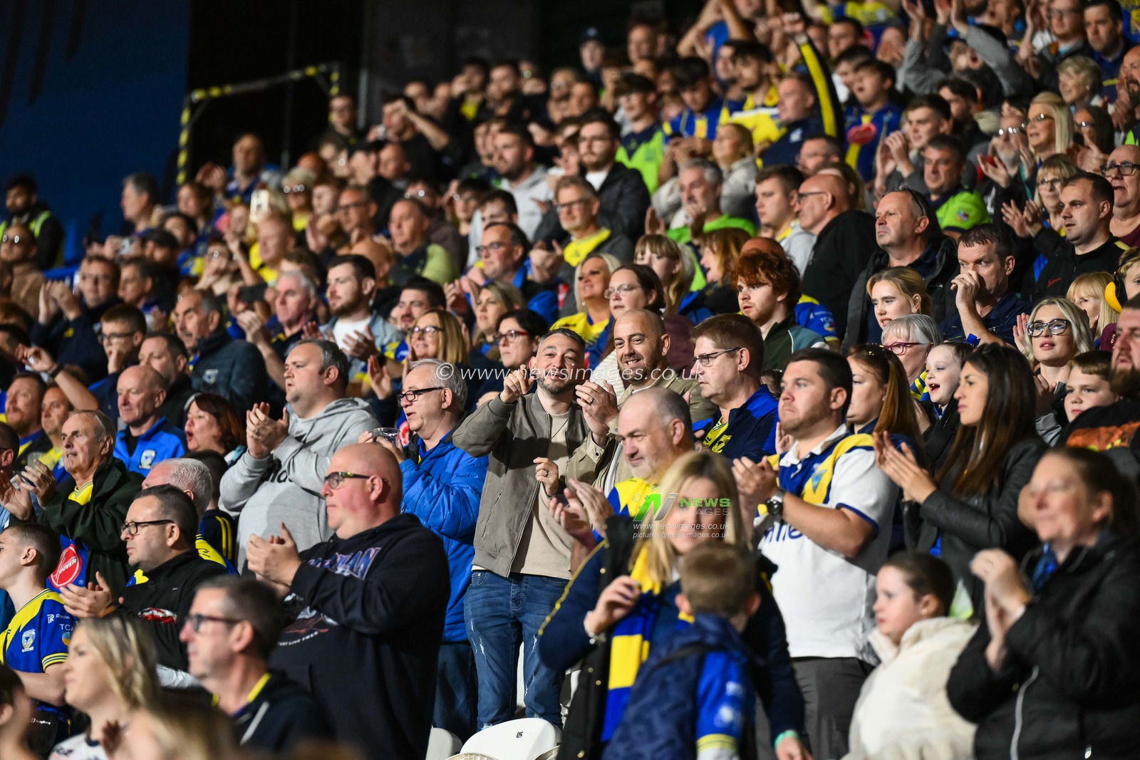 Warrington fans celebrate with the players at the end of the Betfred Super League Round 26 match Huddersfield Giants vs Warrington Wolves at John Smith's Stadium, Huddersfield, United Kingdom, 14th September 2024

(Photo by Craig Thomas/News Images)