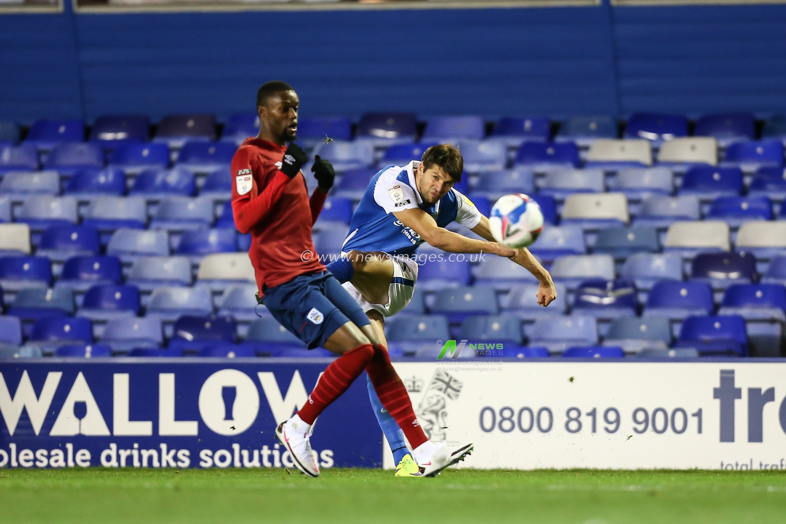 George Friend (5) of Birmingham City crosses the ball
