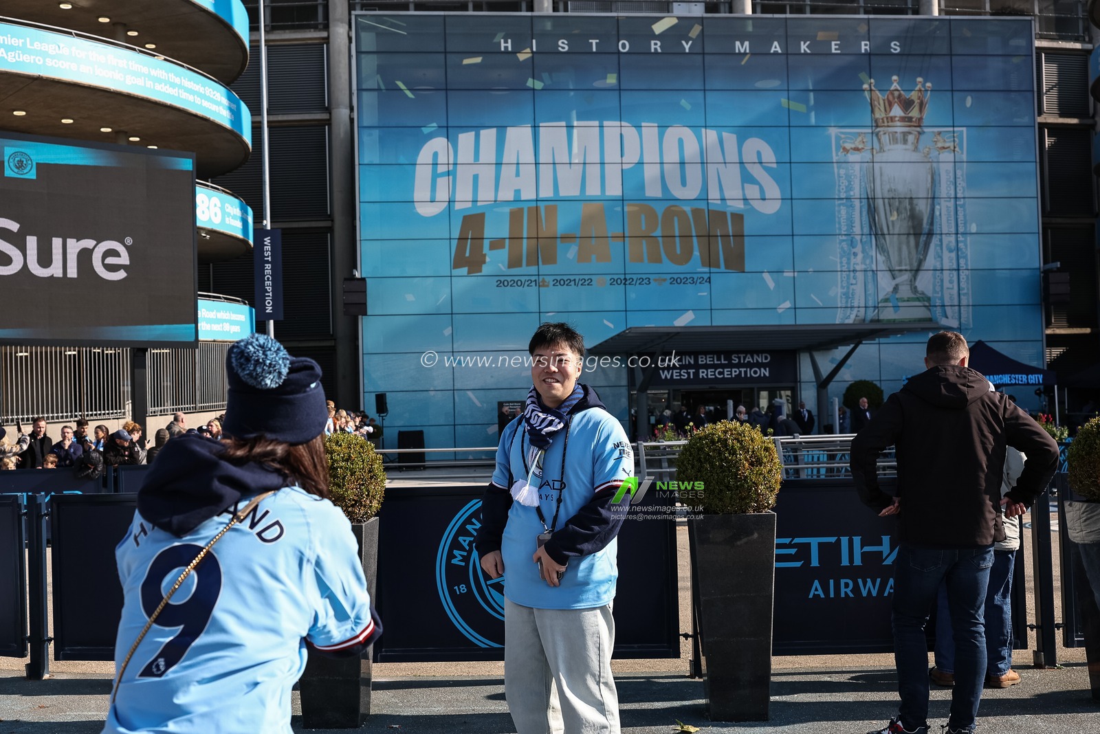 Fans take selfies during the Premier League match Manchester City vs Fulham at Etihad Stadium, Manchester, United Kingdom, 5th October 2024

(Photo by Mark Cosgrove/News Images)