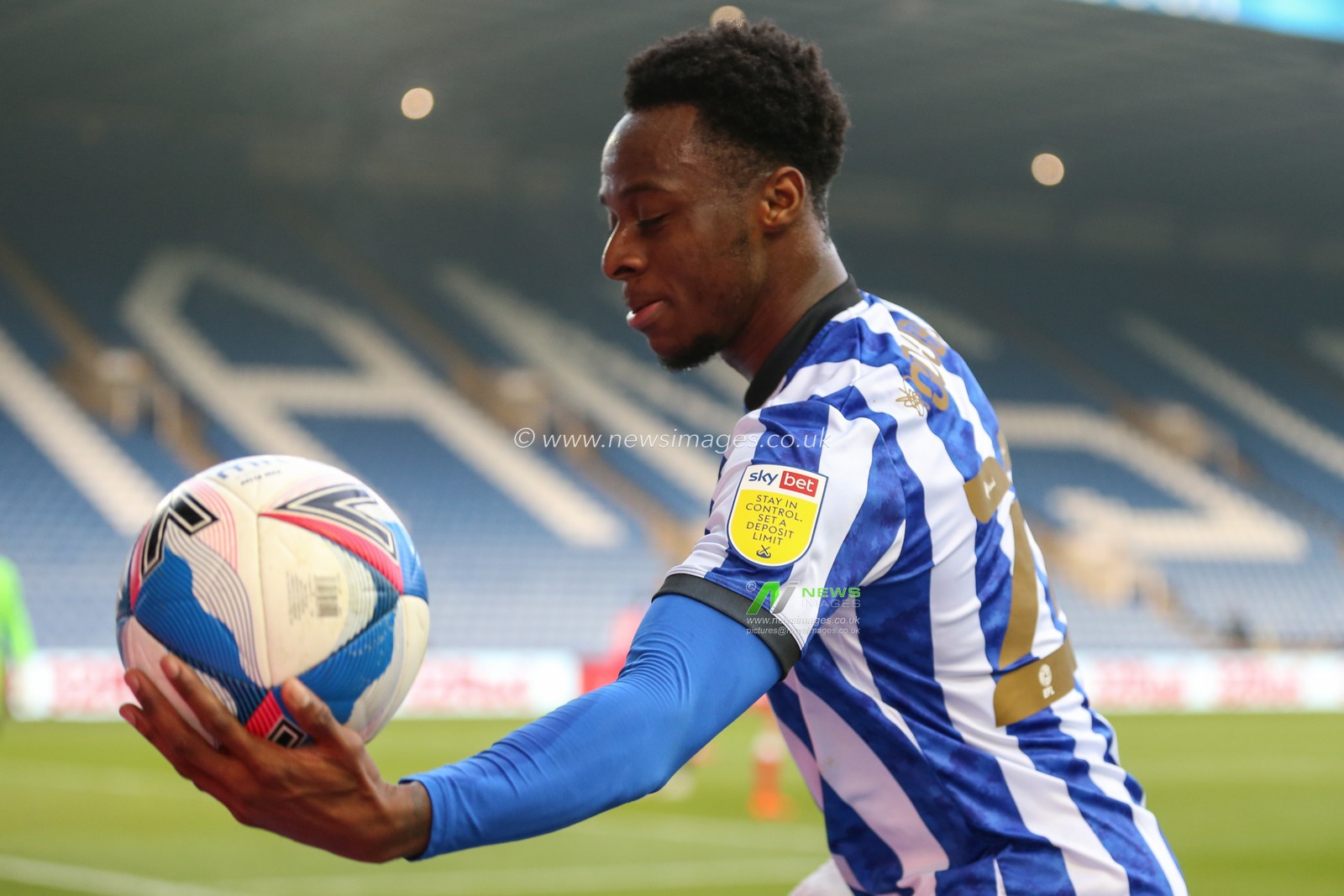 â€œStay In Control Set A Deposit Limitâ€ branding seen on the shirt of Moses Odubajo #22 of Sheffield Wednesday