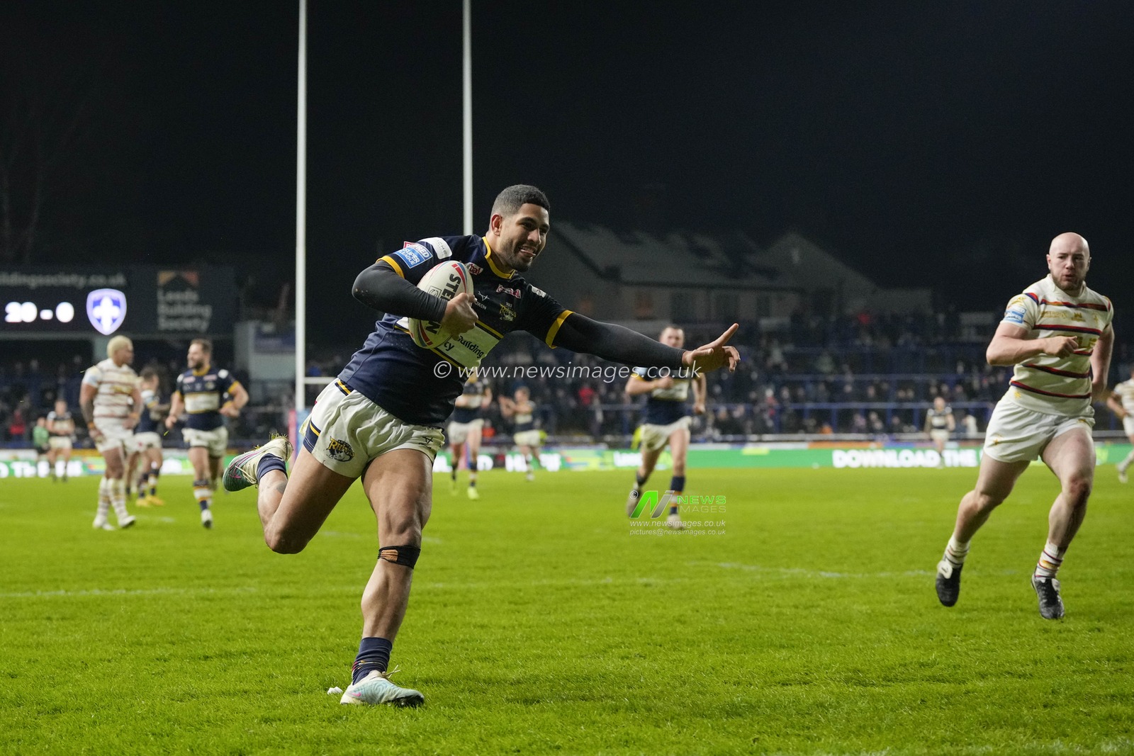 Nene Macdonald #4 of Leeds Rhinos salutes the fans as he breaks away to score during the Betfred Super League Round 4 match Leeds Rhinos vs Wakefield Trinity at Headingley Stadium, Leeds, United Kingdom, 10th March 2023

(Photo by Steve Flynn/News Images)