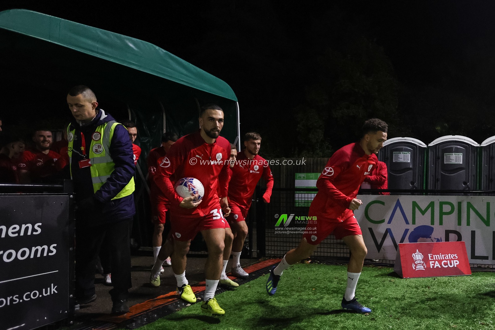 Jordan Williams #2 of Barnsley leads his team out for the warm up season during the Emirates FA Cup match Horsham FC vs Barnsley at The Camping World Community Stadium, Horsham, United Kingdom, 14th November 2023

(Photo by Mark Cosgrove/News Images)