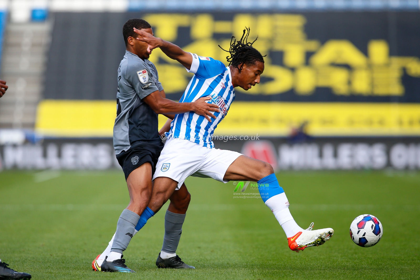 Andy Rinomhota #35 of Cardiff City and Etienne Camara #24 of Huddersfield Town during the Sky Bet Championship match Huddersfield Town vs Cardiff City at John Smith's Stadium, Huddersfield, United Kingdom, 17th September 2022

(Photo by Ben Early/News Images)