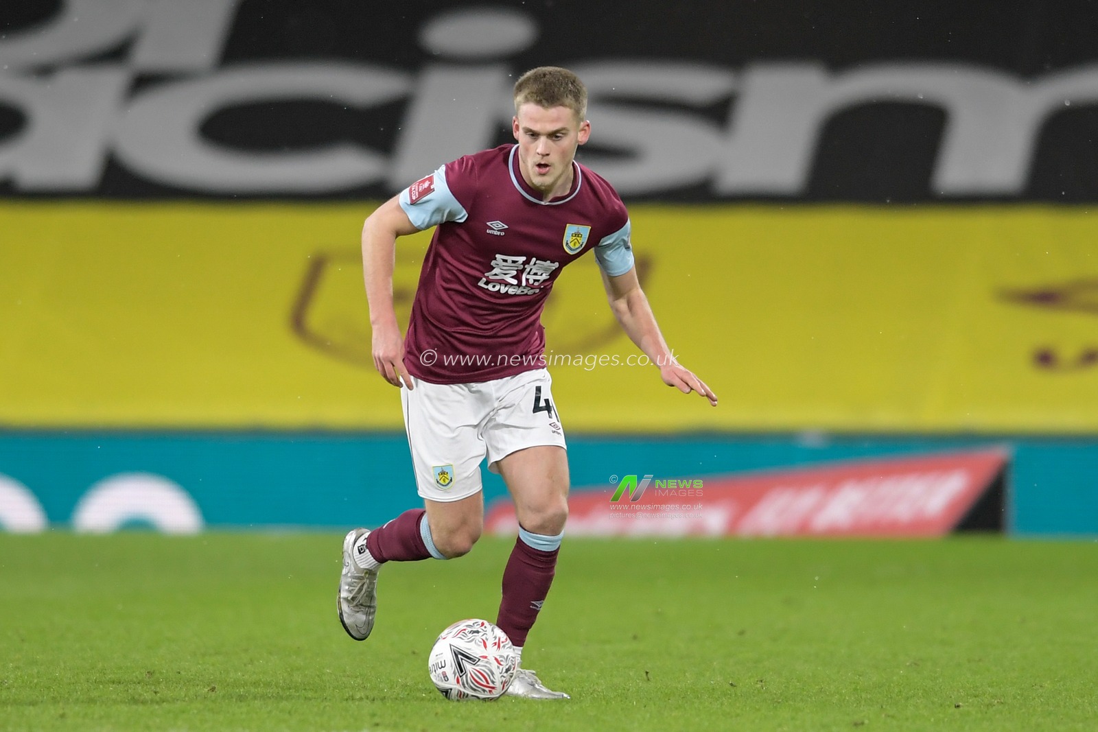 Dwight McNeil #11 of Burnley looks for a player to pass to