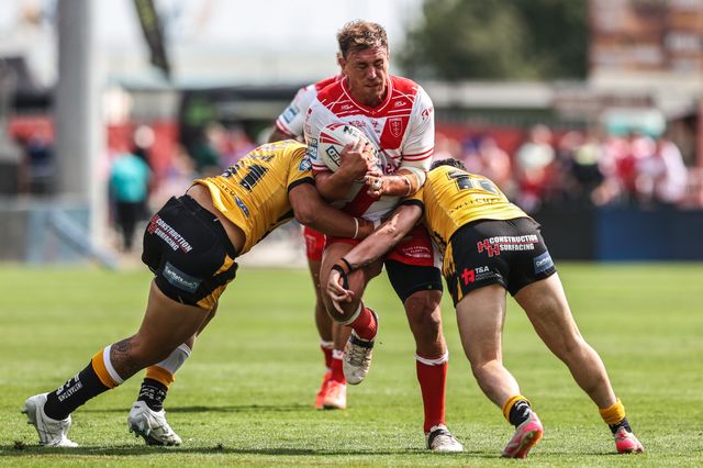Jai Whitbread of Hull KR is tackled during the Betfred Super League round 21 match Hull KR vs Castleford Tigers at Sewell Group Craven Park, Kingston upon Hull, United Kingdom, 9th August 2025

(Photo by Alfie Cosgrove/News Images)