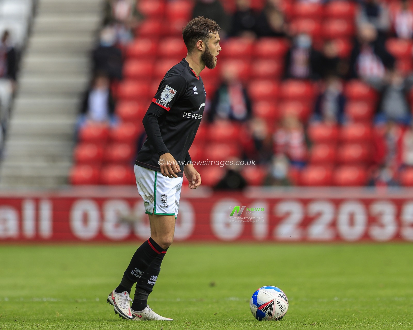 Jorge Grant #10 of Lincoln City in possession of the ball