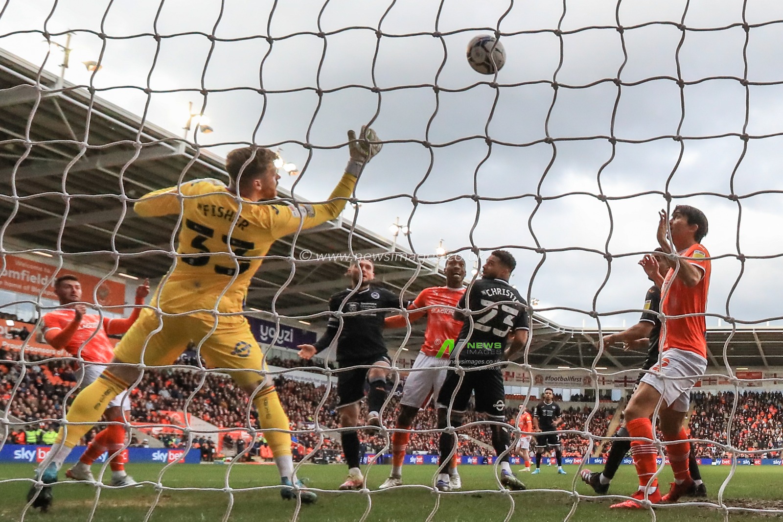 Gary Madine #14 of Blackpool scores to make it 1-0