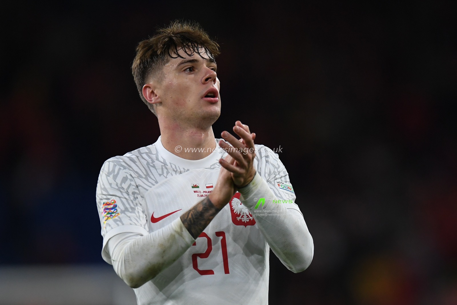 Poland's Nicola Zalewski Applauds the travelling supporters during the UEFA Nations League Group A4 match between Wales vs Poland at Cardiff City Stadium, Cardiff, United Kingdom, 25th September 2022

(Photo by Mike Jones/News Images)