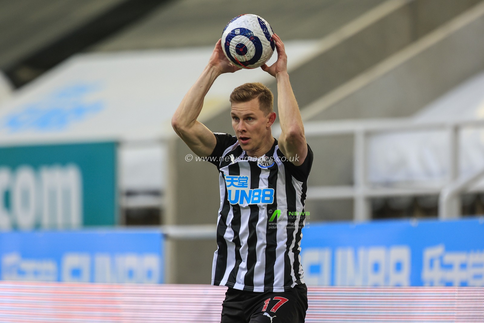 Emil Krafth #17 of Newcastle United takes a throw-in