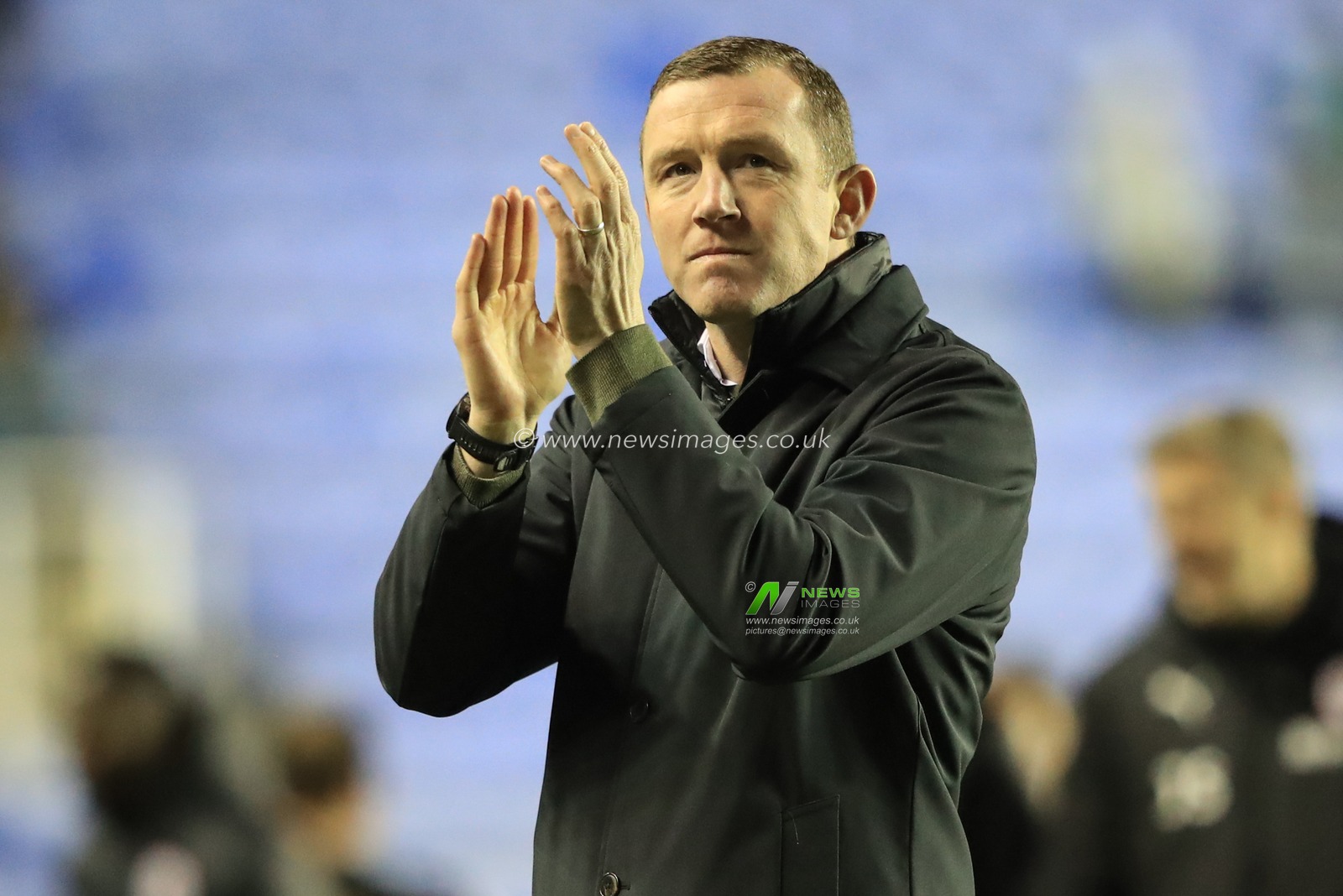 Neill Collins Head coach of Barnsley applauds the travelling fans after a 1-3 win during the Sky Bet League 1 match Reading vs Barnsley at Select Car Leasing Stadium, Reading, United Kingdom, 9th December 2023

(Photo by Alfie Cosgrove/News Images)