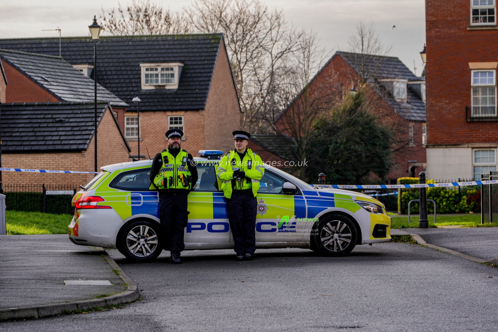 Police officers man a cordon on Cambridge Street, Derby, during a Major Explosives Incident in Derby that began on Thursday December 4 when police executed a warrant at an address on Vulcan Street, Derby, that saw two men arrested on suspicion of explosives offences and 200 homes evacuated (Maynard Manyowa / News Images)
