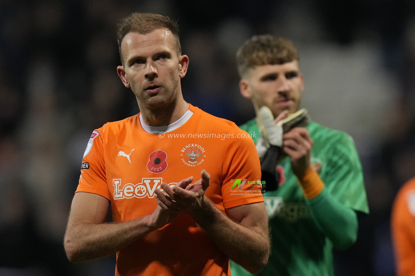 Jordan Rhodes #16 of Blackpool and Daniel Grimshaw #32 of Blackpool salute the fans after the Sky Bet League 1 match Bolton Wanderers vs Blackpool at University of Bolton Stadium, Bolton, United Kingdom, 11th November 2023

(Photo by Steve Flynn/News Images)