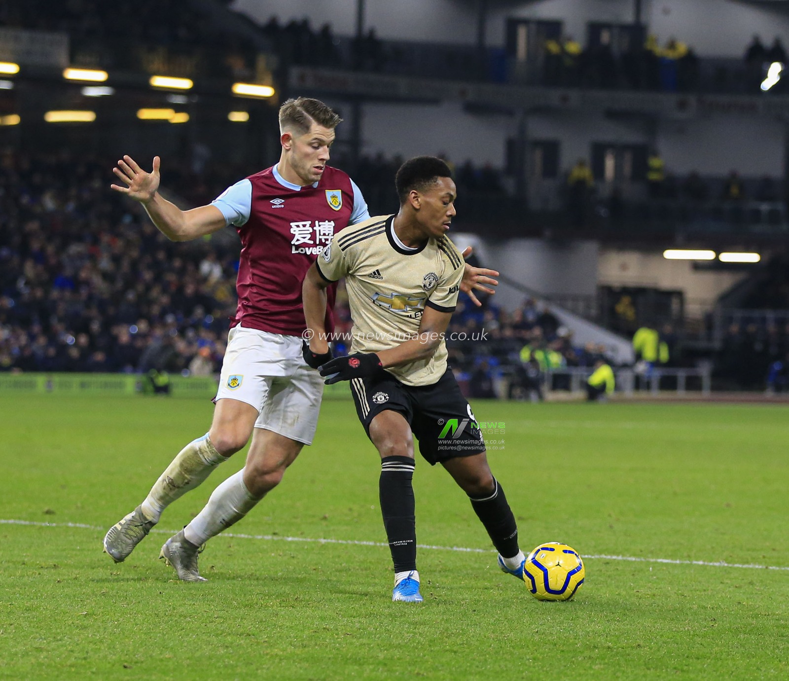 28th December 2019, Turf Moor, Burnley, England; Premier League, Burnley v Manchester United : Anthony Martial (9) of Manchester United and James Tarkowski (5) of Burnley challenge for the ball

Credit: Conor Molloy/News Images