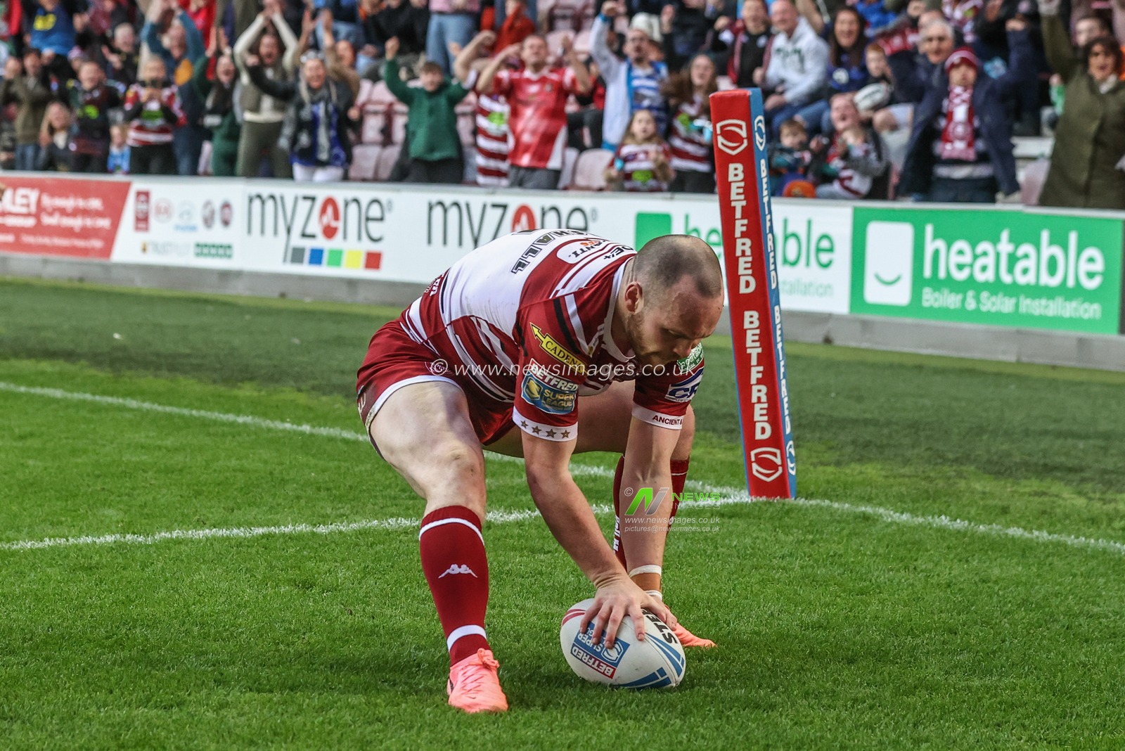 Liam Marshall of Wigan Warriors goes over for a try during the Betfred Super League Semi-Finals match Wigan Warriors vs Leigh Leopards at The Brick Community Stadium, Wigan, United Kingdom, 5th October 2024

(Photo by Alfie Cosgrove/News Images)