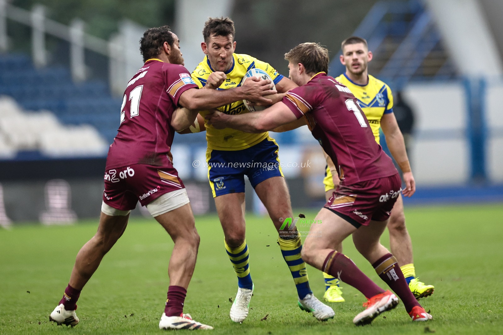 Stefan Ratchford of Warrington Wolves is tackled by Leroy Cudjoe of Huddersfield Giants during the Betfred Super League Round 1 match Huddersfield Giants vs Warrington Wolves at John Smith's Stadium, Huddersfield, United Kingdom, 16th February 2025

(Photo by Mark Cosgrove/News Images)