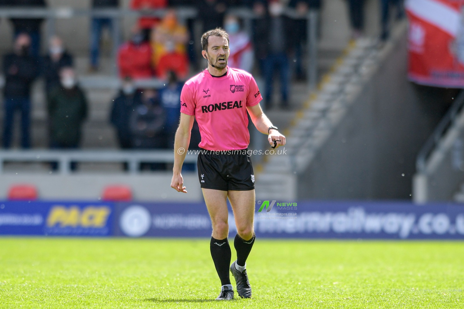 Referee James Child in action during the game