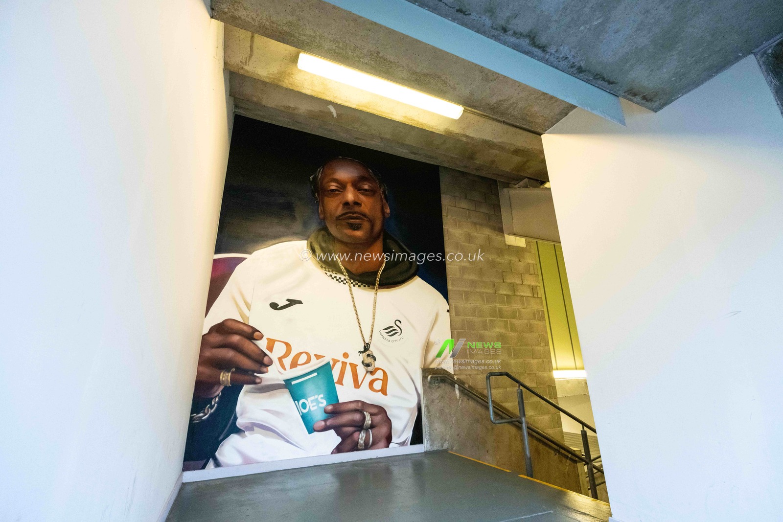 General view of the Snoop Dogg mural at the Swansea.com stadium, by artist Hasan Kamil during the Carabao Cup 3rd Round Swansea City vs Nottingham Forest at Swansea.com Stadium, Swansea, United Kingdom, 17th September 2025

(Photo by Andrew Lewis/News Images)