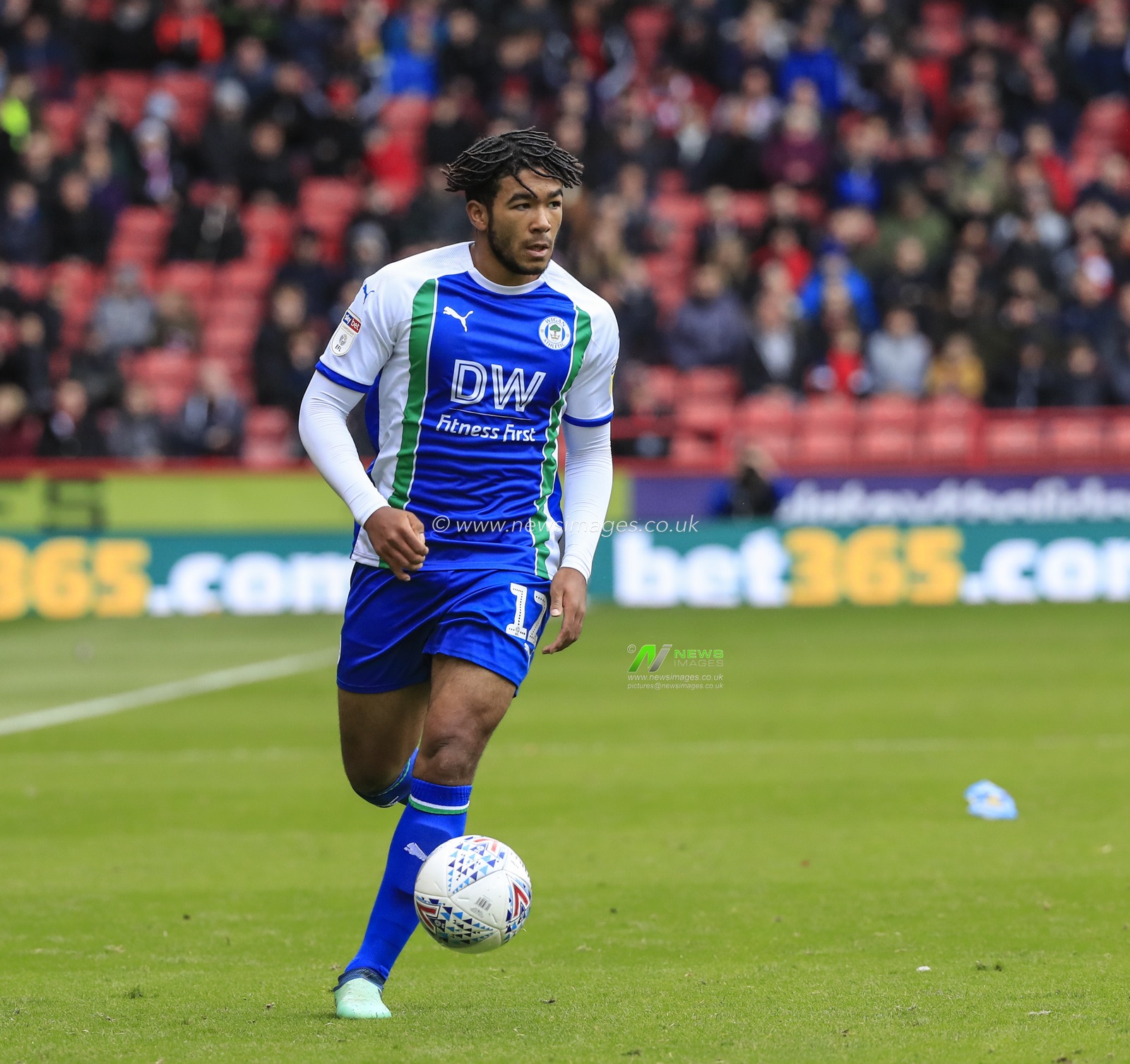 27th October 2018, Bramall Lane, Sheffield, England; Sky Bet Championship, Sheffield United v Wigan ; Reece James (12) of Wigan Athletic moves the ball forward

Credit: Conor Molloy/News Images

English Football League images are subject to DataCo Licence