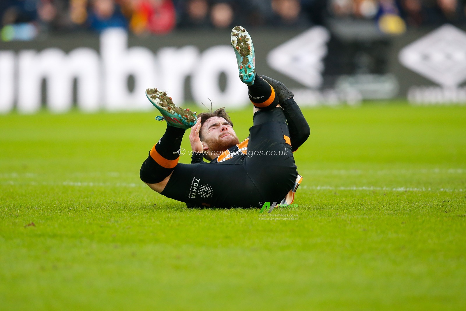 Aaron Connolly #44 of Hull City goes down after taking a knock during the Sky Bet Championship match Hull City vs Queens Park Rangers at MKM Stadium, Hull, United Kingdom, 28th January 2023

(Photo by Ben Early/News Images)
