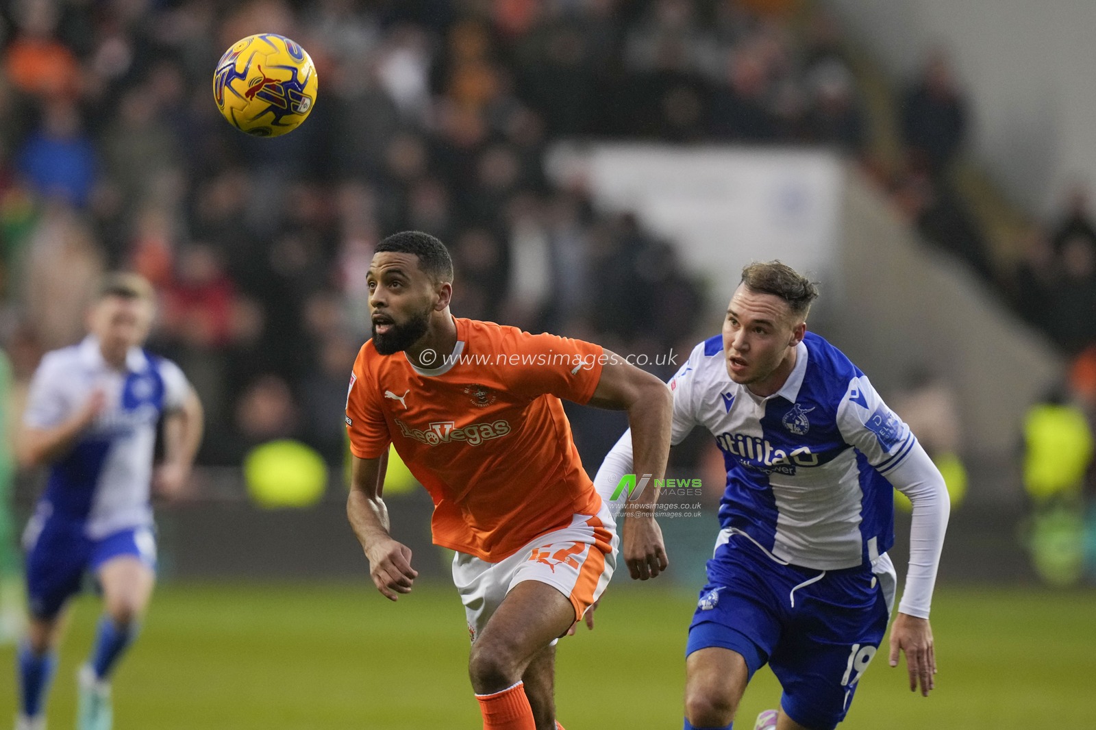 CJ Hamilton #22 of Blackpool competes for the ball with Harvey Vale #19 of Bristol Rovers during the Sky Bet League 1 match Blackpool vs Bristol Rovers at Bloomfield Road, Blackpool, United Kingdom, 23rd December 2023

(Photo by Steve Flynn/News Images)