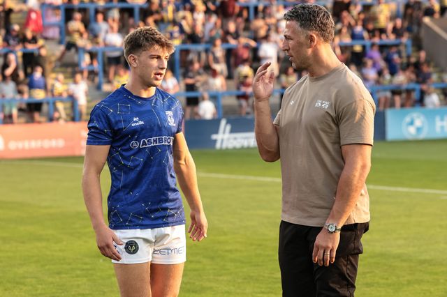 Ewan Irwin of Warrington Wolves and Sam Burgess head coach of Warrington Wolves in the pre-game warm up during the Betfred Super League round 23 match Warrington Wolves vs York Knights at The Halliwell Jones Stadium, Warrington, United Kingdom on 13 August 2026

(Photo by Mark Cosgrove/News Images)