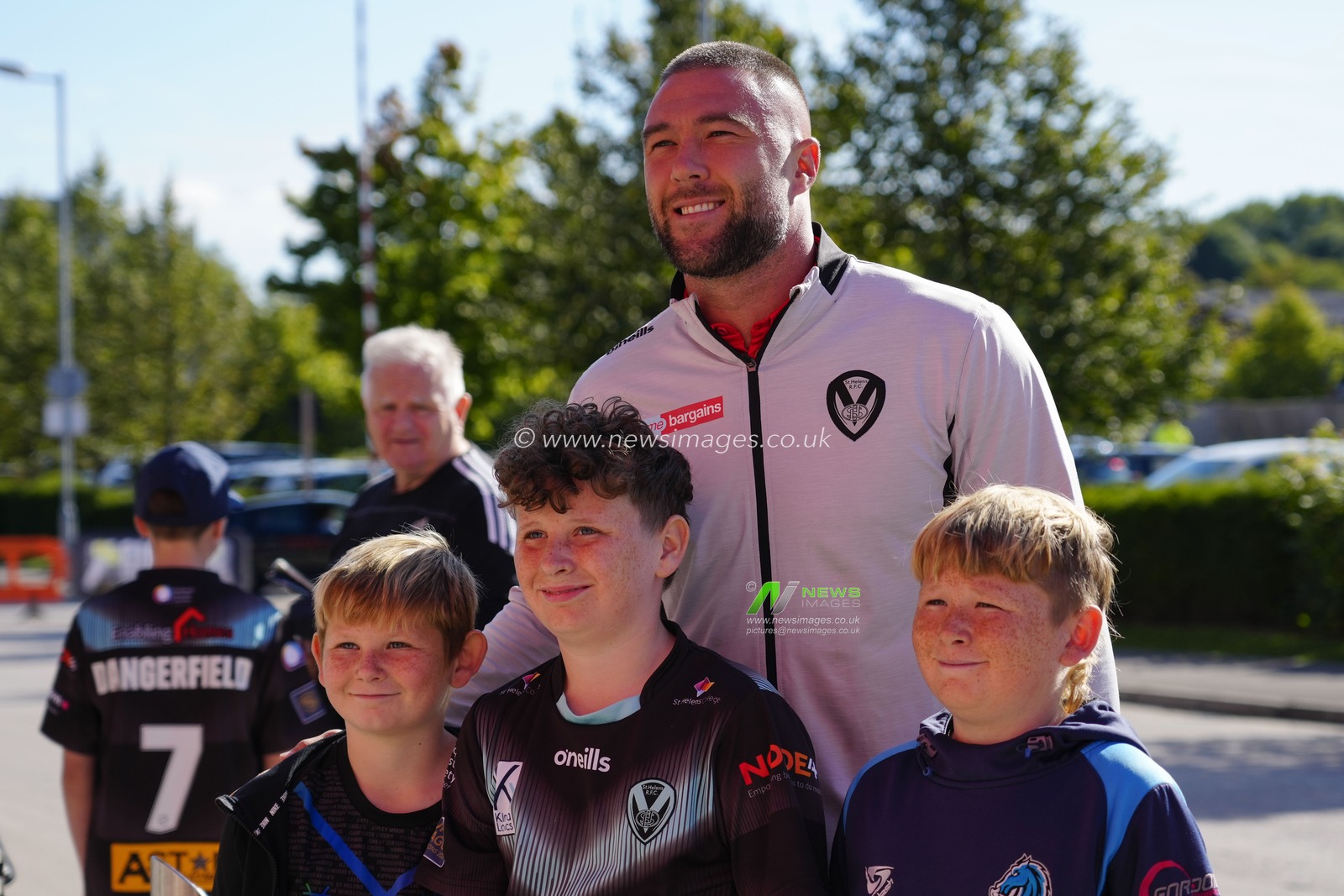 Curtis Sironen #16 of St Helens  poses for a photo with fans before the Betfred Super League match St Helens vs Salford Red Devils at Totally Wicked Stadium, St Helens, United Kingdom, 17th September 2022

(Photo by Steve Flynn/News Images)