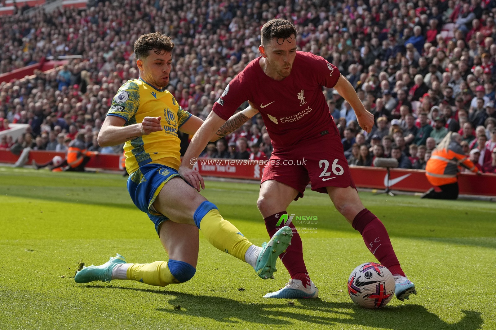 Neco Williams #7 of Nottingham Forest slides in to tackle Andrew Robertson #26 of Liverpool during the Premier League match Liverpool vs Nottingham Forest at Anfield, Liverpool, United Kingdom, 22nd April 2023

(Photo by Steve Flynn/News Images)