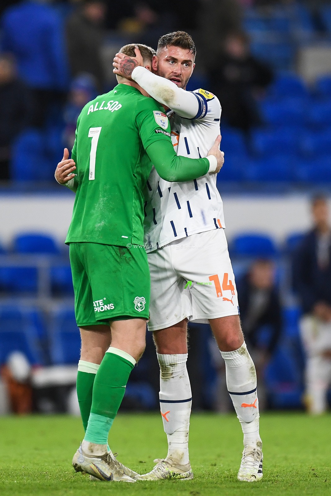 Gary Madine #14 of Blackpool and Ryan Allsop #1 of Cardiff City  following the final whistle of the Sky Bet Championship match Cardiff City vs Blackpool at Cardiff City Stadium, Cardiff, United Kingdom, 17th December 2022

(Photo by Mike Jones/News Images)