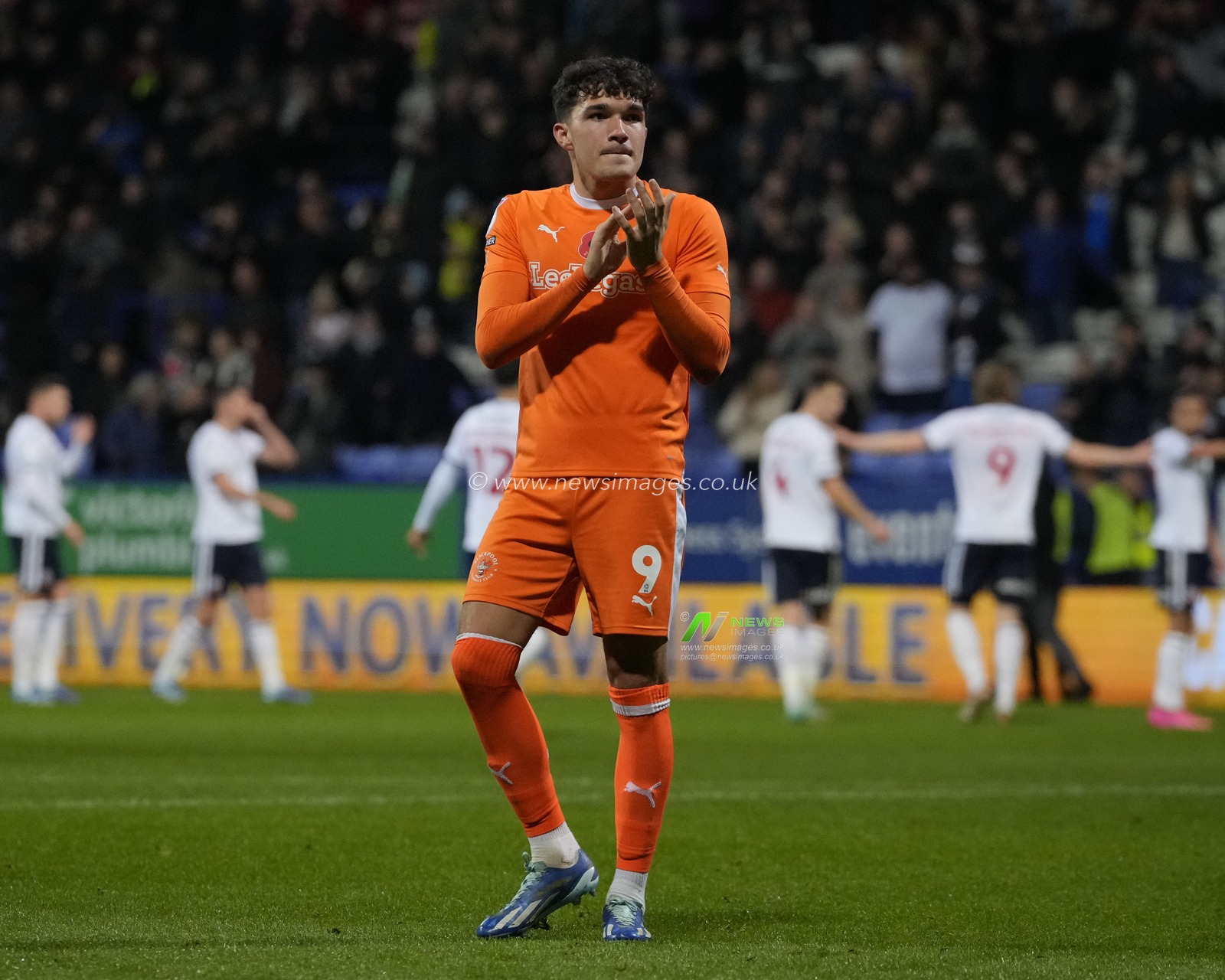 Kyle Joseph #9 of Blackpool salutes the fans after the Sky Bet League 1 match Bolton Wanderers vs Blackpool at University of Bolton Stadium, Bolton, United Kingdom, 11th November 2023

(Photo by Steve Flynn/News Images)