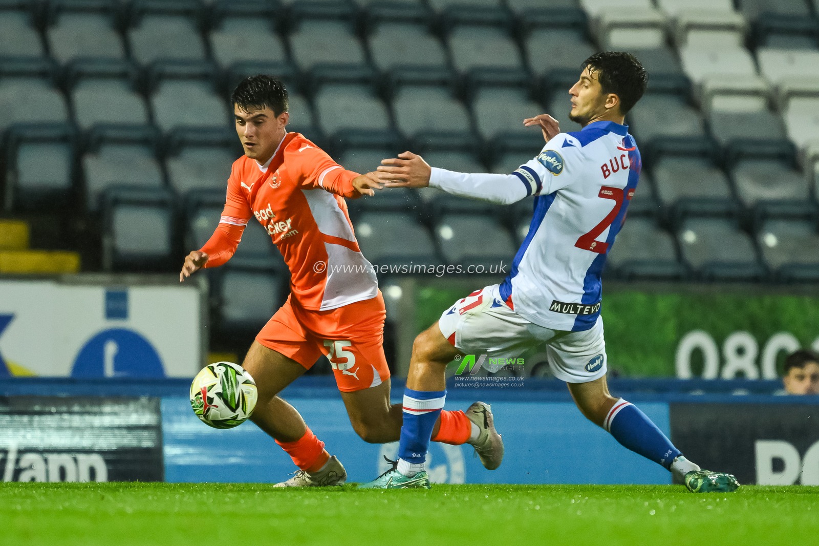 Rob Apter of Blackpool evades the challenge of John Buckley of Blackburn Rovers  during the Carabao Cup match Blackburn Rovers vs Blackpool at Ewood Park, Blackburn, United Kingdom, 27th August 2024

(Photo by Craig Thomas/News Images)
