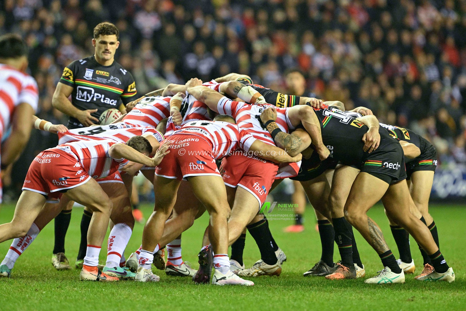 Two teams get ready for a scrum, during the 2024 World Club Challenge match Wigan Warriors vs Penrith Panthers at DW Stadium, Wigan, United Kingdom, 24th February 2024

(Photo by Cody Froggatt/News Images)
