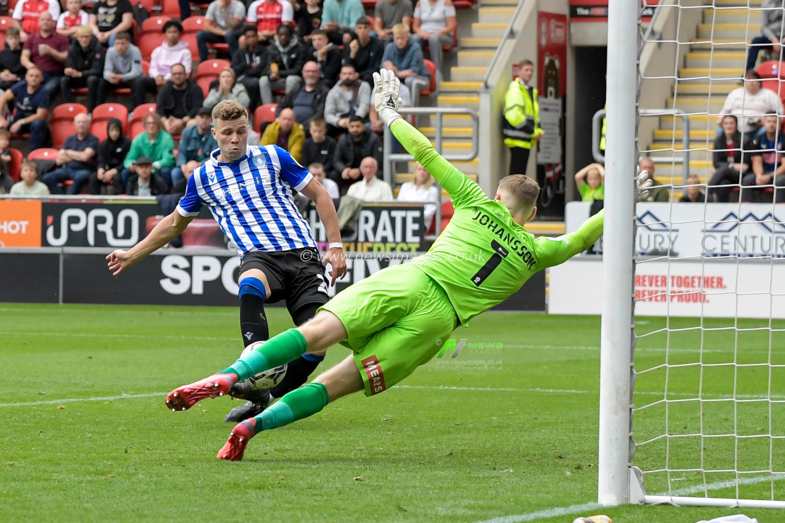Florian Kamberi #20 of Sheffield Wednesday scores a goal to make it 0-1