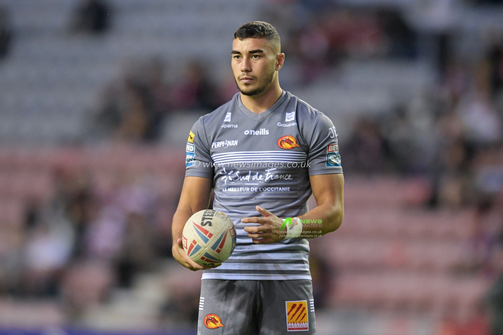 Joe Chan (27) of Catalans Dragons with the ball