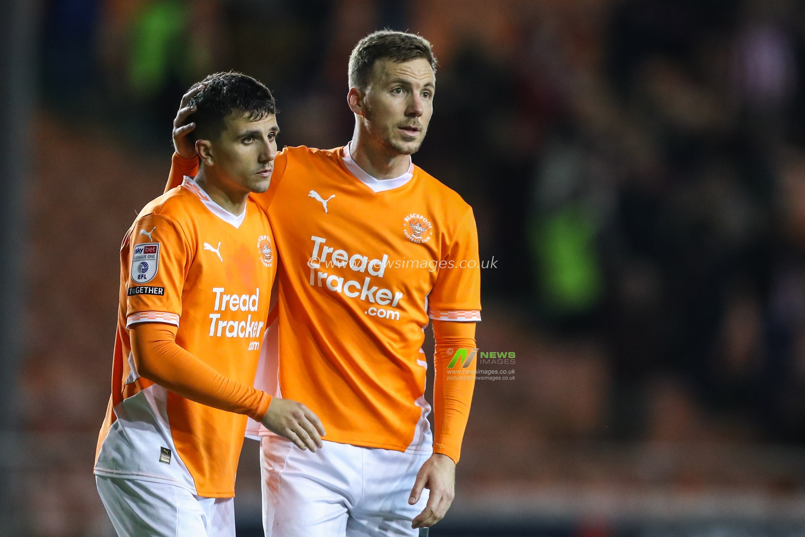 Albie Morgan of Blackpool and Lee Evans of Blackpool embrace after the Sky Bet League 1 match Blackpool vs Lincoln City at Bloomfield Road, Blackpool, United Kingdom, 1st October 2024

(Photo by Gareth Evans/News Images)
