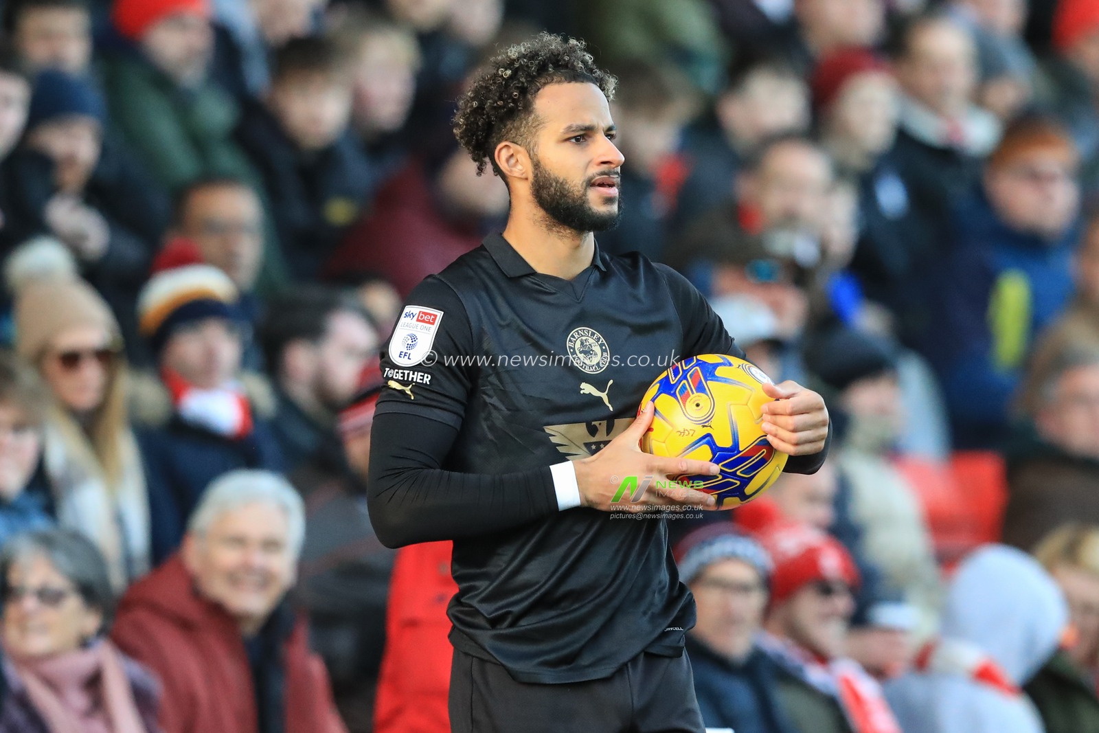Barry Cotter #17 of Barnsley prepares to take a throw in during the Sky Bet League 1 match Lincoln City vs Barnsley at Gelder Group Sincil Bank Stadium, Lincoln, United Kingdom, 25th November 2023

(Photo by Alfie Cosgrove/News Images)