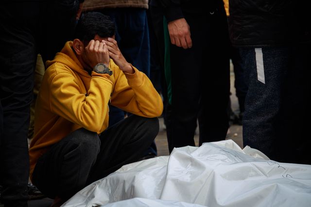 *** Editors note image depicts death *** 
From the farewell of the families of the dead, about 14 dead, including children, were killed when their home was targeted by Israeli aircraft in the Nuseirat camp in the central Gaza Strip last night.(Photo: Mohammed Skaik/News Images)