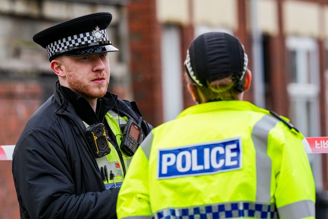 Police officers man a cordon on Cambridge Street, Derby, during a Major Explosives Incident in Derby that began on Thursday December 4 when police executed a warrant at an address on Vulcan Street, Derby, that saw two men arrested on suspicion of explosives offences and 200 homes evacuated (Maynard Manyowa / News Images)